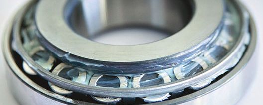 Greased roller bearing