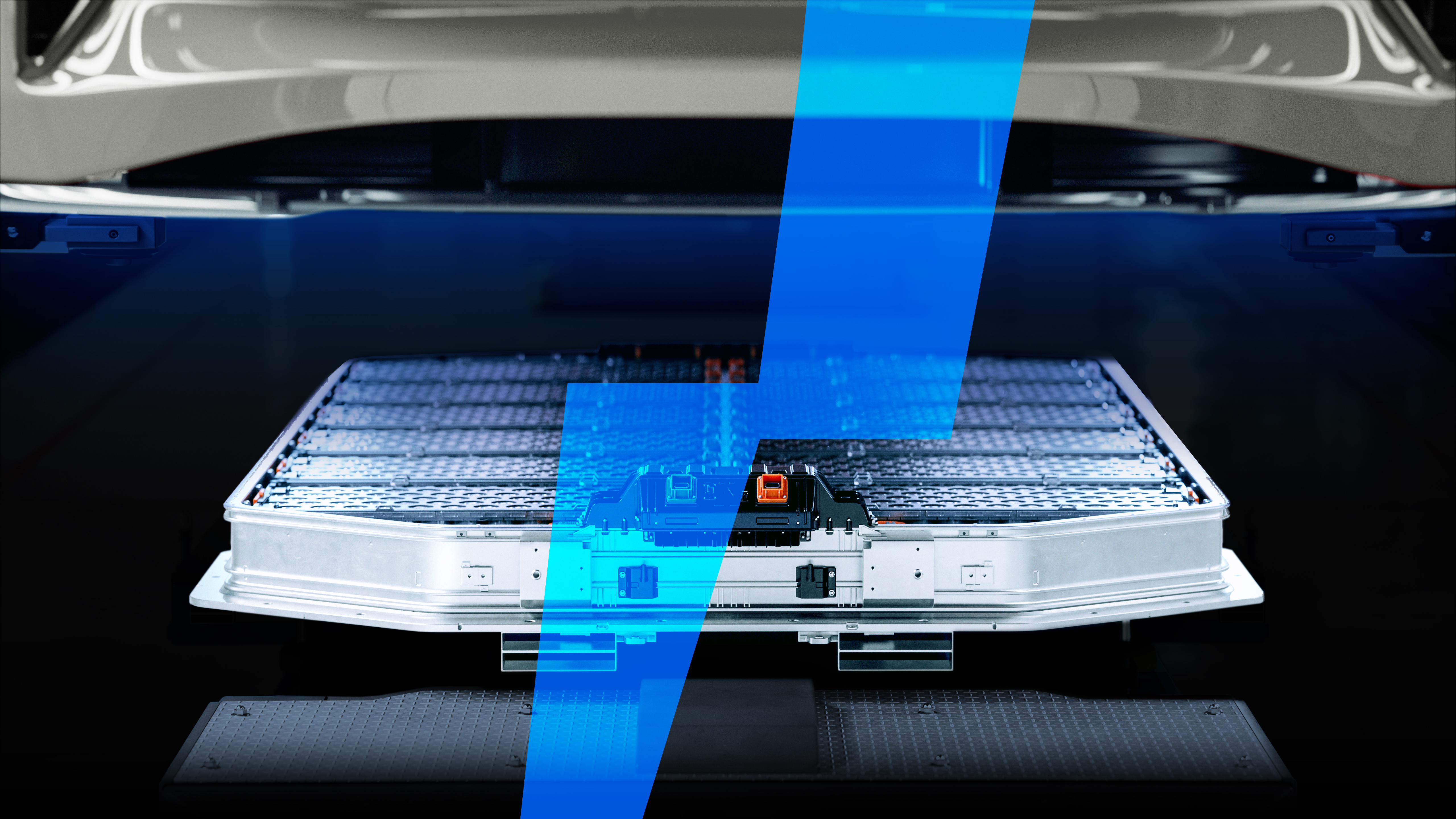 Generic EV Battery Pack on Electric Car Production Line inside Modern Factory. Lithium-ion High-voltage Battery for Electric Vehicle or Hybrid Car. High Capacity Battery for Automotive Industry. Generic EV Battery Pack on Electric Car Production Line inside Modern Factory. Lithium-ion High-voltage Battery for Electric Vehicle or Hybrid Car. High Capacity Battery for Automotive Industry.