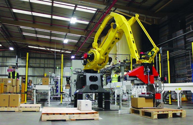 FUCHS UK lubricant manufacturing plant robot arm