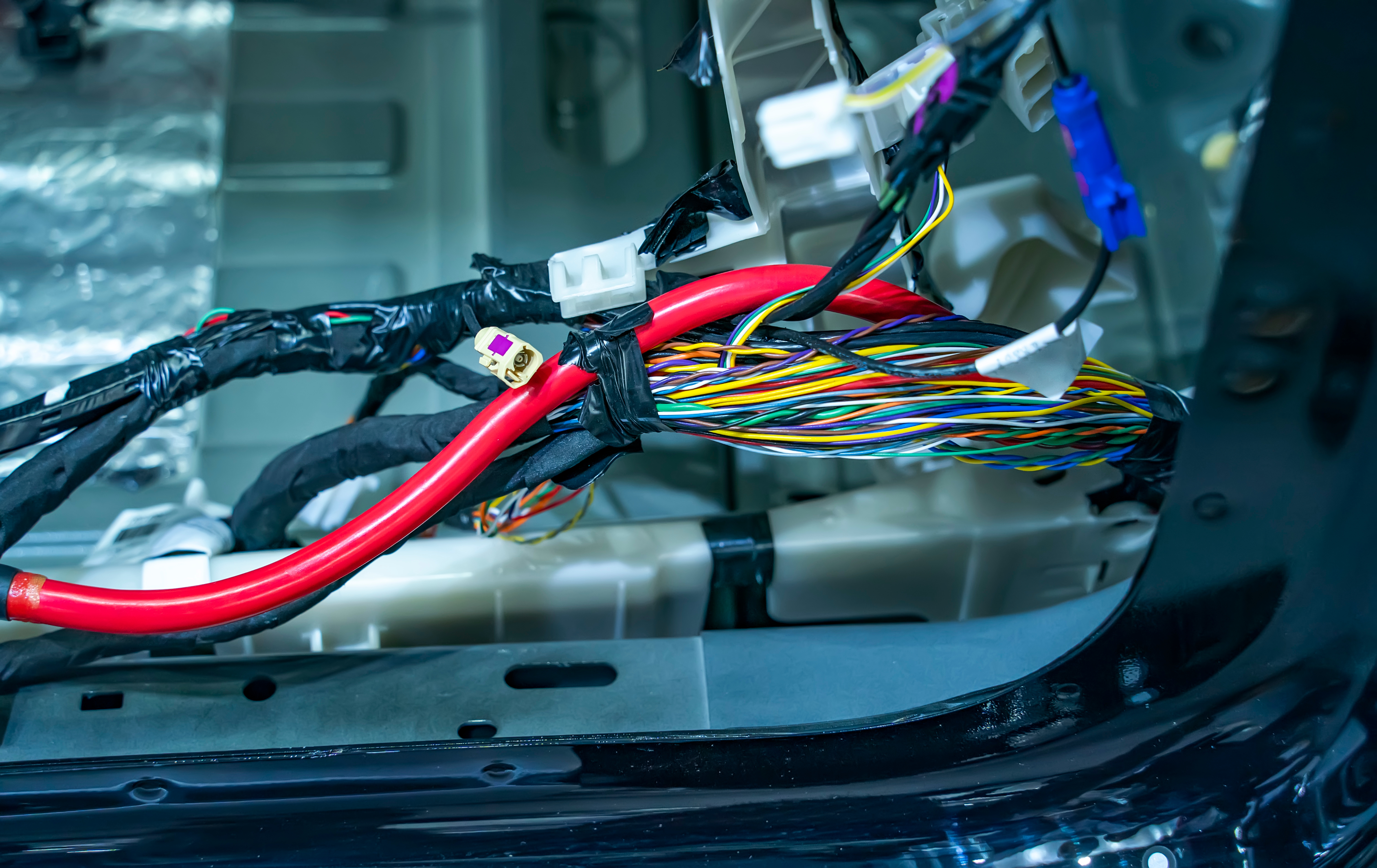 Large wide cable with wires and connectors and terminals in the wiring repair shop and electricians for connecting Large wide cable with wires and connectors and terminals in the wiring repair shop and electricians for connecting